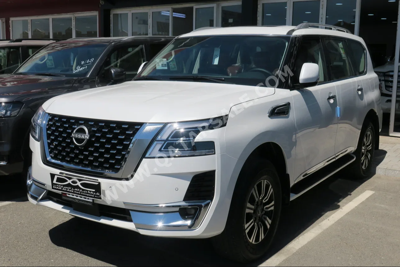 Nissan  Patrol  Titanium  2024  Automatic  0 Km  6 Cylinder  Four Wheel Drive (4WD)  SUV  White  With Warranty