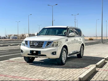 Nissan  Patrol  SE  2014  Automatic  230,000 Km  8 Cylinder  Four Wheel Drive (4WD)  SUV  White