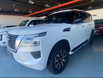 Nissan  Patrol  SE  2023  Automatic  9,000 Km  6 Cylinder  Four Wheel Drive (4WD)  SUV  White  With Warranty