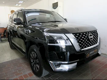 Nissan  Patrol  Titanium  2024  Automatic  15,000 Km  6 Cylinder  Four Wheel Drive (4WD)  SUV  Black  With Warranty