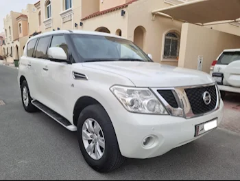 Nissan  Patrol  SE  2013  Automatic  179,000 Km  8 Cylinder  Four Wheel Drive (4WD)  SUV  White