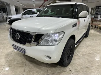 Nissan  Patrol  SE  2012  Automatic  260,000 Km  8 Cylinder  Four Wheel Drive (4WD)  SUV  White