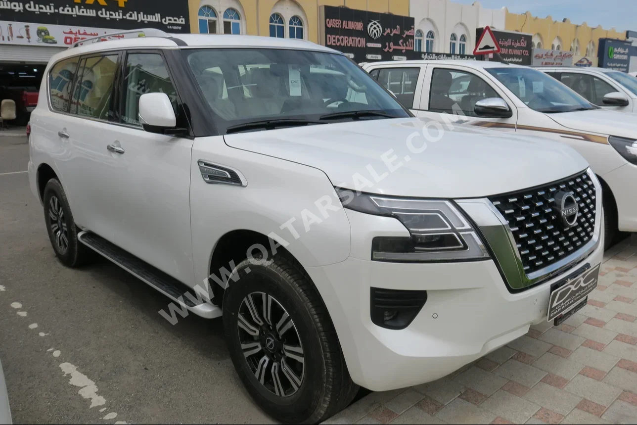 Nissan  Patrol  SE  2023  Automatic  0 Km  6 Cylinder  Four Wheel Drive (4WD)  SUV  White  With Warranty