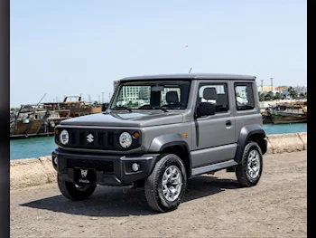 Suzuki  Jimny  2022  Automatic  8,000 Km  4 Cylinder  Four Wheel Drive (4WD)  SUV  Gray  With Warranty