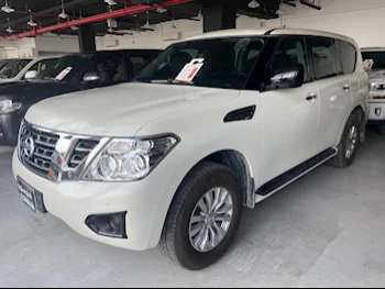 Nissan  Patrol  XE  2019  Automatic  118,000 Km  6 Cylinder  Four Wheel Drive (4WD)  SUV  White