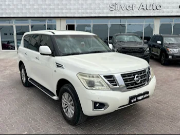 Nissan  Patrol  SE  2015  Automatic  227,000 Km  8 Cylinder  Four Wheel Drive (4WD)  SUV  White