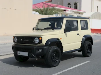 Suzuki  Jimny  2021  Automatic  17,000 Km  4 Cylinder  Four Wheel Drive (4WD)  SUV  Beige  With Warranty