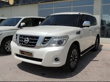 Nissan  Patrol  Platinum  2015  Automatic  170,000 Km  8 Cylinder  Four Wheel Drive (4WD)  SUV  White