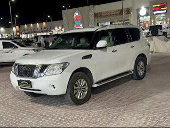 Nissan  Patrol  SE  2012  Automatic  321,000 Km  8 Cylinder  Four Wheel Drive (4WD)  SUV  White