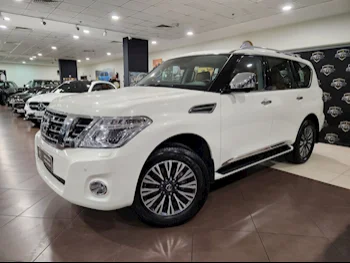 Nissan  Patrol  Platinum  2019  Automatic  42,000 Km  6 Cylinder  Four Wheel Drive (4WD)  SUV  White  With Warranty