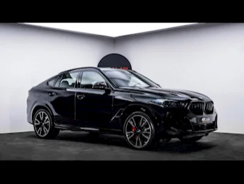 BMW  X-Series  X6 M60i  2024  Automatic  0 Km  8 Cylinder  Four Wheel Drive (4WD)  SUV  Black  With Warranty