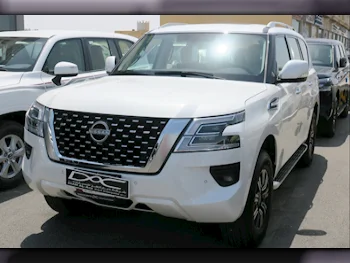 Nissan  Patrol  SE  2023  Automatic  0 Km  6 Cylinder  Four Wheel Drive (4WD)  SUV  White  With Warranty