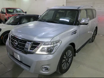 Nissan  Patrol  Platinum  2014  Automatic  251,000 Km  8 Cylinder  Four Wheel Drive (4WD)  SUV  Silver