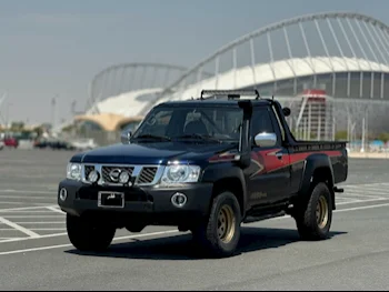 Nissan  Patrol  SGL  2014  Automatic  174,000 Km  6 Cylinder  Four Wheel Drive (4WD)  Pick Up  Black