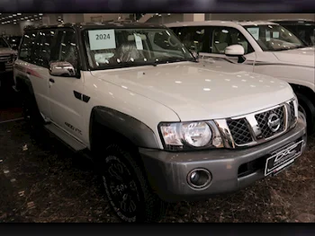  Nissan  Patrol  Super Safari  2024  Automatic  0 Km  6 Cylinder  Four Wheel Drive (4WD)  SUV  White  With Warranty