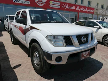 Nissan  Navara  SE  2013  Manual  264,000 Km  4 Cylinder  Four Wheel Drive (4WD)  Pick Up  White