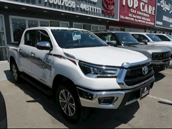 Toyota  Hilux  2024  Automatic  0 Km  4 Cylinder  Four Wheel Drive (4WD)  Pick Up  White  With Warranty