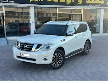 Nissan  Patrol  Platinum  2015  Automatic  250,000 Km  8 Cylinder  Four Wheel Drive (4WD)  SUV  White