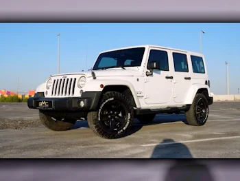 Jeep  Wrangler  Sahara  2016  Automatic  77,000 Km  6 Cylinder  Four Wheel Drive (4WD)  SUV  White