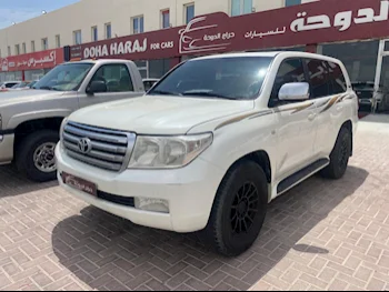 Toyota  Land Cruiser  GX  2010  Automatic  568,000 Km  6 Cylinder  Four Wheel Drive (4WD)  SUV  White