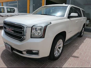 GMC  Yukon  XL  2015  Automatic  147,000 Km  8 Cylinder  Four Wheel Drive (4WD)  SUV  White