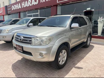 Toyota  Fortuner  2010  Automatic  198,000 Km  6 Cylinder  Four Wheel Drive (4WD)  SUV  Gold