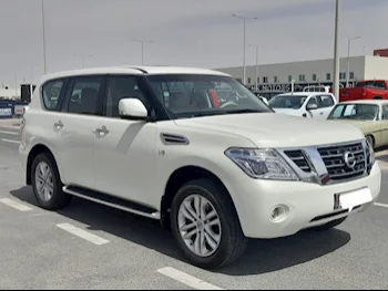 Nissan  Patrol  SE  2013  Automatic  193,000 Km  8 Cylinder  Four Wheel Drive (4WD)  SUV  White