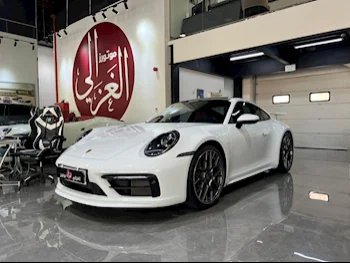  بورش  911  كاريرا  2022  اوتوماتيك  32,000 كم  6 سلندر  دفع خلفي  كوبيه \ سبورت  أبيض  تحت الضمان