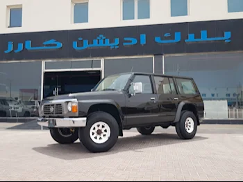 Nissan  Patrol  Safari  1995  Manual  646,000 Km  6 Cylinder  Four Wheel Drive (4WD)  SUV  Black