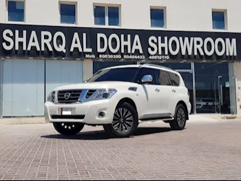 Nissan  Patrol  Platinum  2015  Automatic  180,000 Km  8 Cylinder  Four Wheel Drive (4WD)  SUV  White