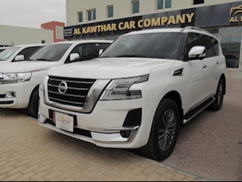 Nissan  Patrol  Platinum  2021  Automatic  39,000 Km  6 Cylinder  Four Wheel Drive (4WD)  SUV  White  With Warranty