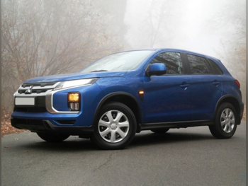 متسوبيشي  اي اس اكس  إس يو في 4 في 4  أبيض  2023