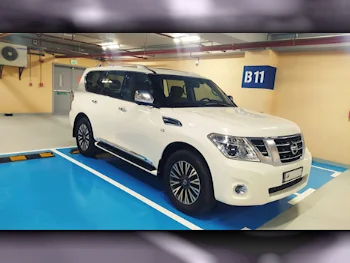 Nissan  Patrol  Platinum  2014  Automatic  169,000 Km  8 Cylinder  Four Wheel Drive (4WD)  SUV  White