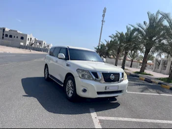 Nissan  Patrol  LE  2012  Automatic  254,000 Km  8 Cylinder  Four Wheel Drive (4WD)  SUV  White