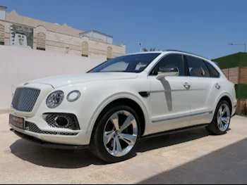 Bentley  Bentayga  Mulliner  2017  Automatic  75,000 Km  12 Cylinder  All Wheel Drive (AWD)  SUV  White  With Warranty