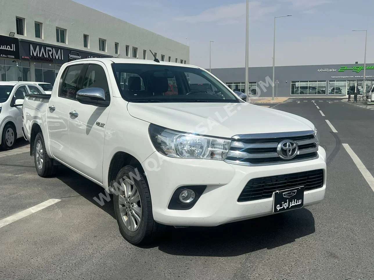 Toyota  Hilux  SR5  2020  Automatic  125,000 Km  4 Cylinder  Four Wheel Drive (4WD)  Pick Up  White