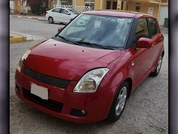 Suzuki  Swift  2007  Automatic  177,000 Km  4 Cylinder  Front Wheel Drive (FWD)  Hatchback  Red