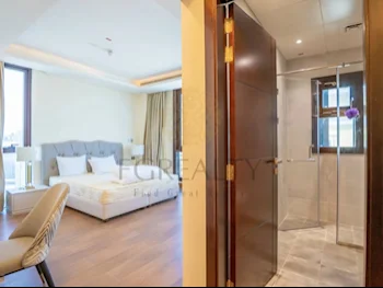 3 Bedrooms  Apartment  For Rent  in Doha -  The Pearl  Fully Furnished