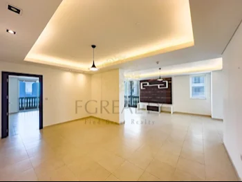 2 Bedrooms  Apartment  For Rent  in Doha -  The Pearl  Not Furnished