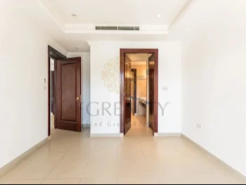 2 Bedrooms  Apartment  For Rent  in Doha -  The Pearl  Fully Furnished