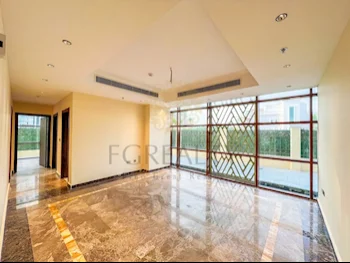 2 Bedrooms  Apartment  For Rent  in Doha -  The Pearl  Not Furnished