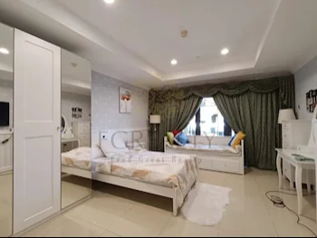 2 Bedrooms  Apartment  For Rent  in Doha -  The Pearl  Fully Furnished