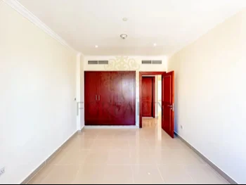 3 Bedrooms  Apartment  For Rent  in Doha -  The Pearl  Not Furnished