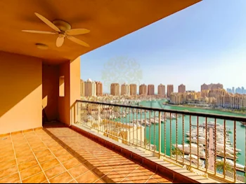 2 Bedrooms  Apartment  For Rent  in Doha -  The Pearl  Fully Furnished