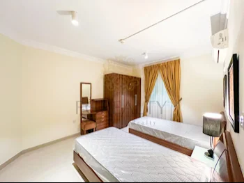 2 Bedrooms  Apartment  For Rent  in Doha -  Umm Ghuwailina  Fully Furnished