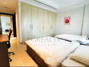 2 Bedrooms  Apartment  For Rent  in Doha -  The Pearl  Fully Furnished