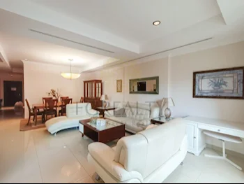 2 Bedrooms  Apartment  For Rent  in Doha -  The Pearl  Fully Furnished