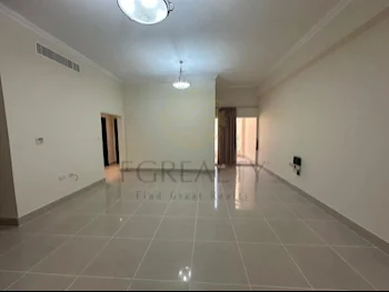 2 Bedrooms  Apartment  For Rent  in Doha -  Fereej Bin Mahmoud  Not Furnished