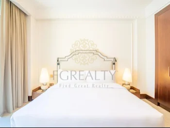 2 Bedrooms  Apartment  For Rent  in Doha -  The Pearl  Fully Furnished