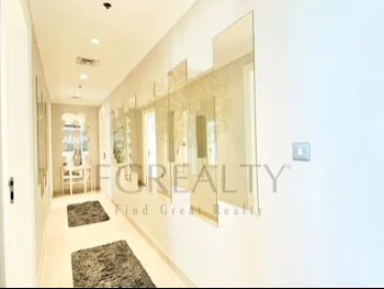 2 Bedrooms  Apartment  For Rent  in Doha -  The Pearl  Fully Furnished